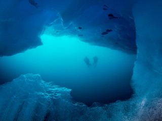 looking-out-of-cave-w-2-divers