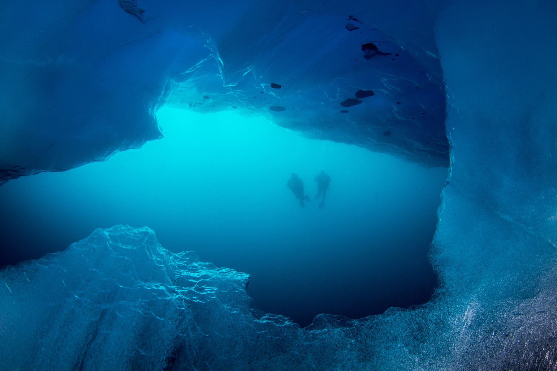 looking-out-of-cave-w-2-divers-copy